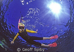 young snorkeller by Geoff Spiby 